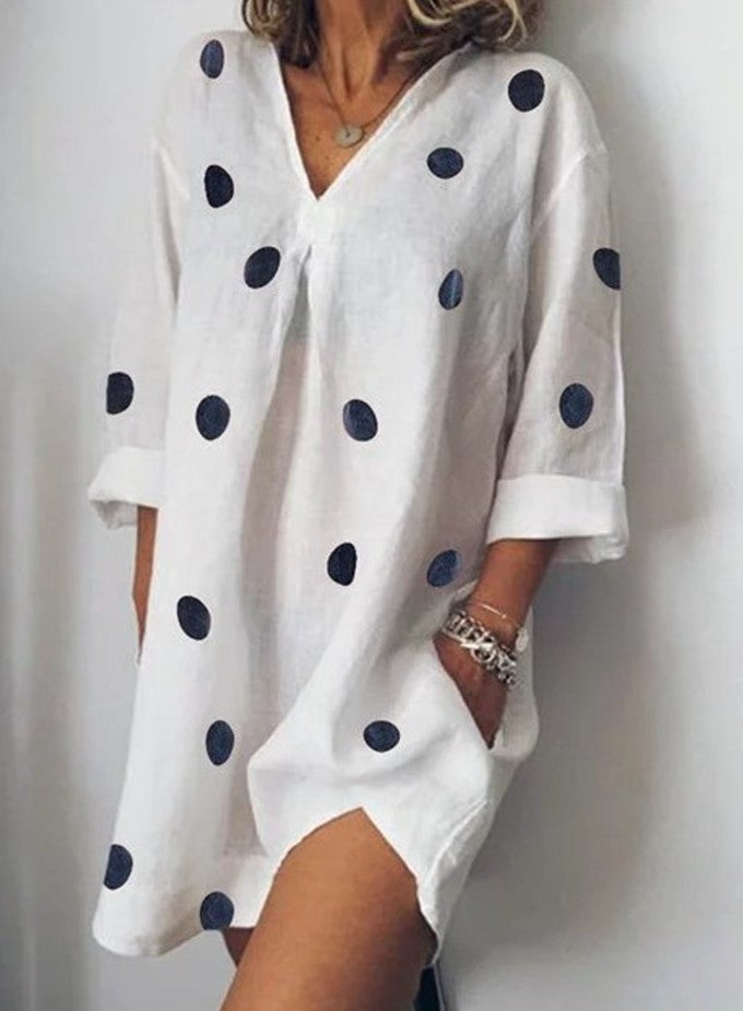 Uchenna - losse v-hals polka dot jurk met split