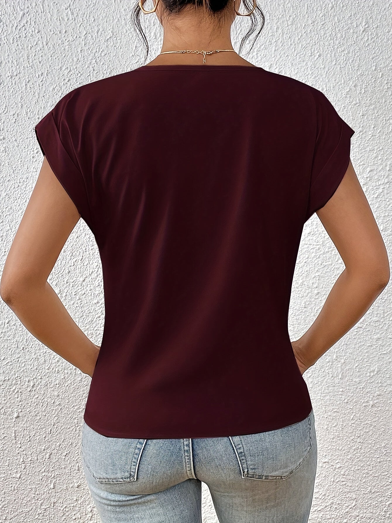 V-neck blouse with draped front design for women