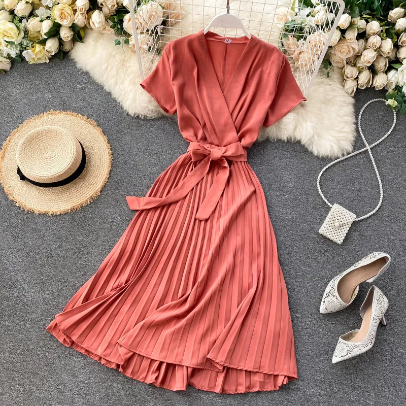 Knee-Length Pleated Dress with High Waist and V-Neck in Solid Color