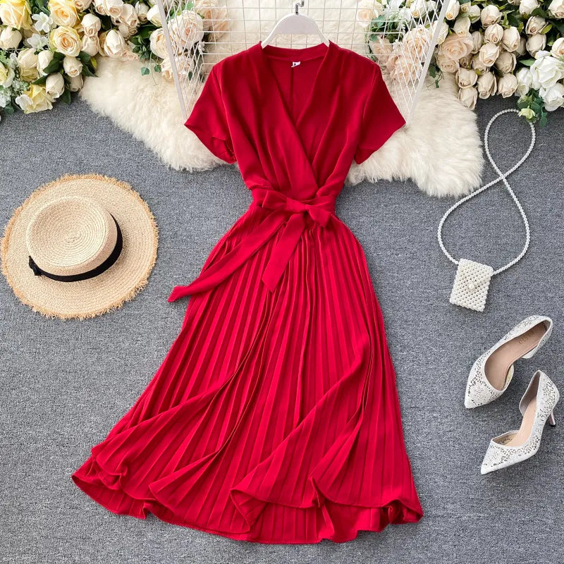 Knee-Length Pleated Dress with High Waist and V-Neck in Solid Color