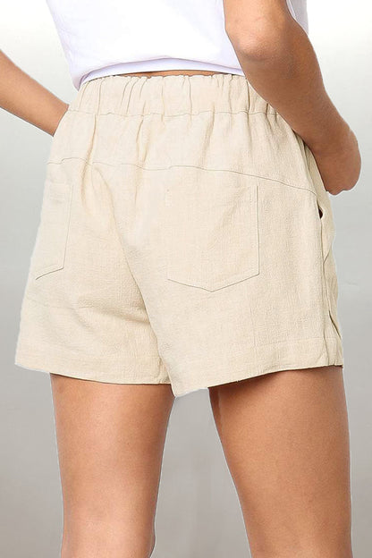 Women's shorts with drawstring waist and slanted pockets