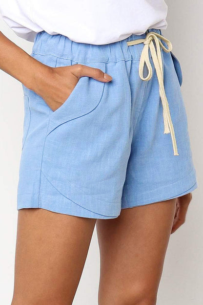 Women's shorts with drawstring waist and slanted pockets