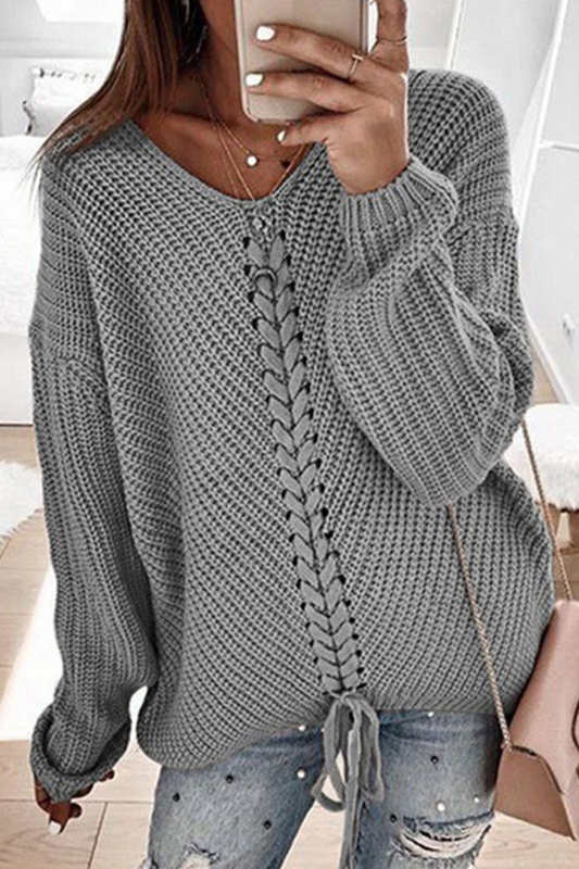 Women's round neck sweater with long sleeves and a front braided design