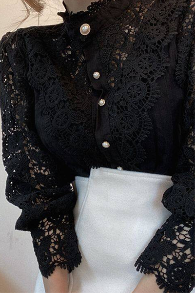 Elegant women's blouse with embroidered openwork details