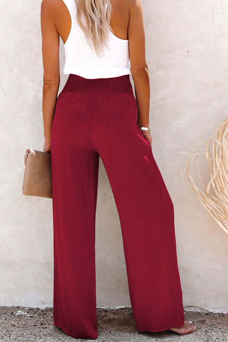 Wide leg trousers with button closure for women