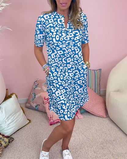 Women’s Mini Dress – Relaxed Fit – V-Neck – Short Sleeve – Natural Fibers – Pockets – Abstract Print