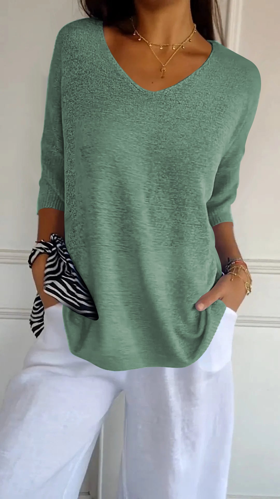 Women's simple loose v-neck knitted top