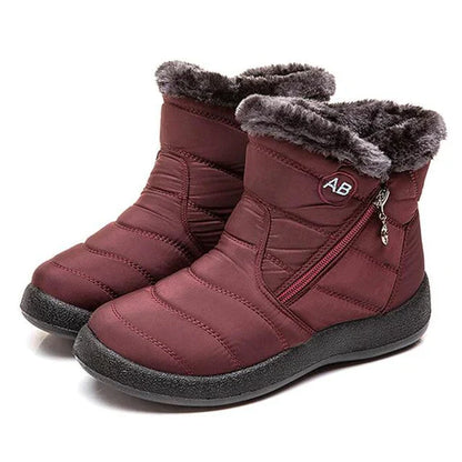 Women's warm winter snow boots with fur trim and zipper closure