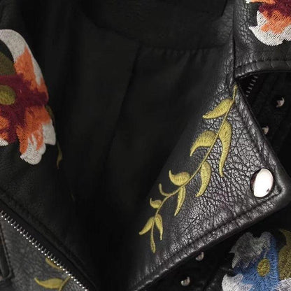 Women's casual leather jacket with floral design