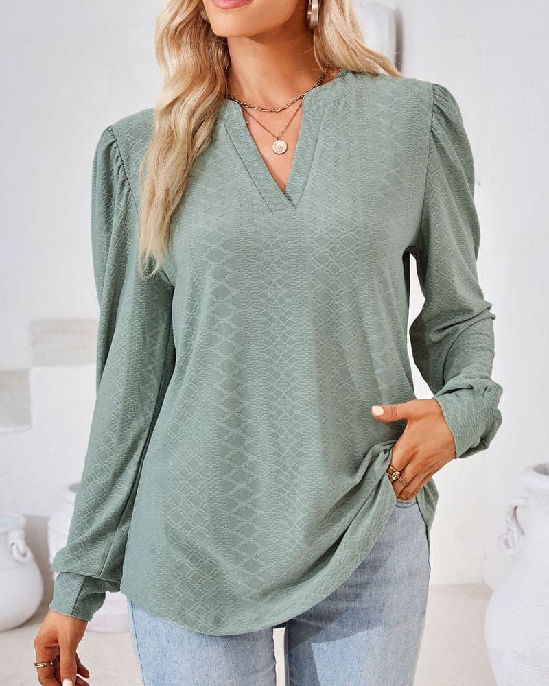 Women's stylish blouse with v-neckline and long sleeves