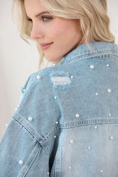 Women's denim jacket with raw hem and pearl trim