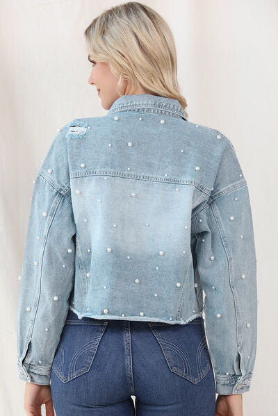 Women's denim jacket with raw hem and pearl trim