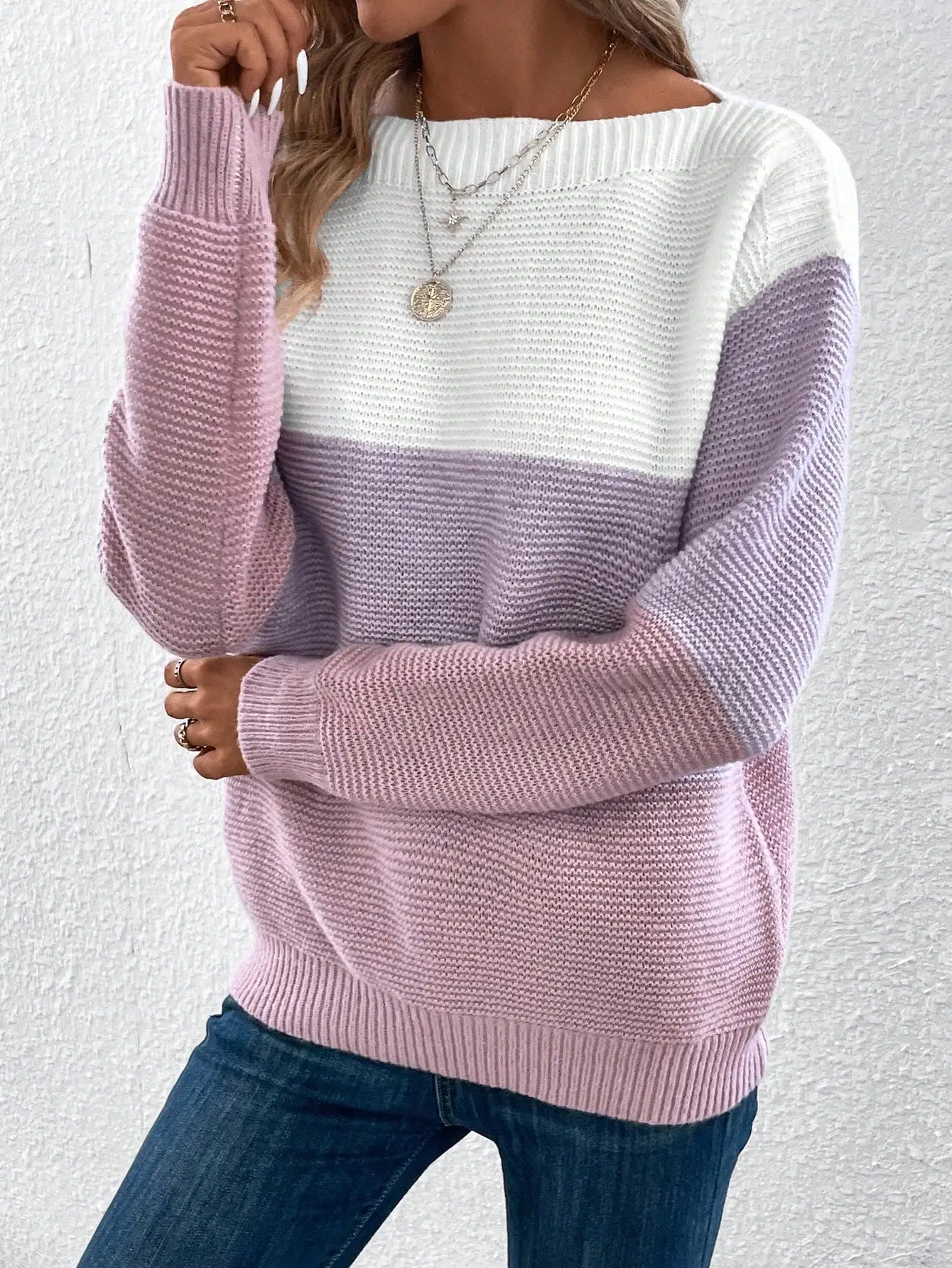 Women's long arm knit sweater with round neckline