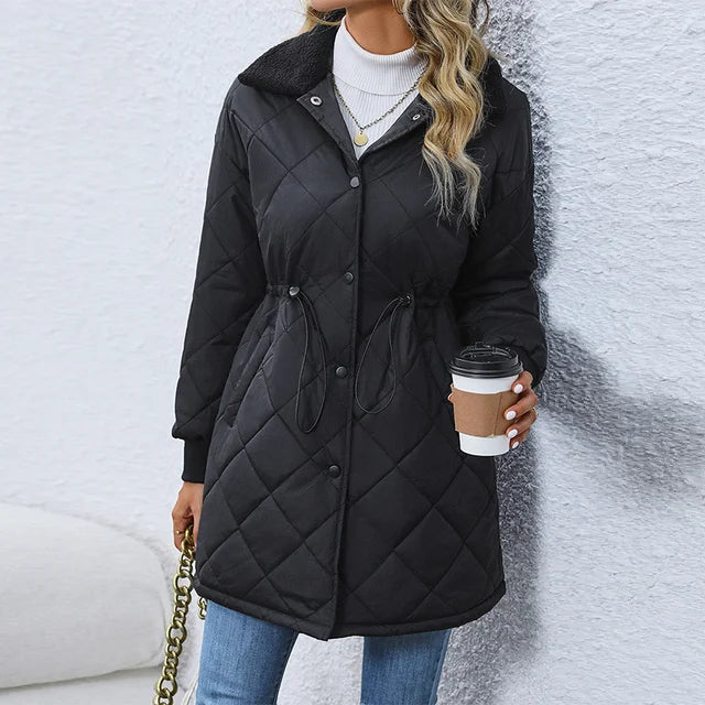 Women's long winter coat with button closure, waist tie, and straight cu