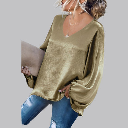 Women's satin blouse with v-neck and lantern sleeves