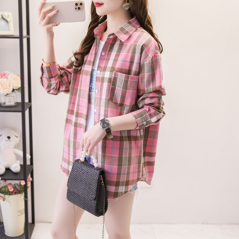 Women's long sleeve plaid shirt with button closure