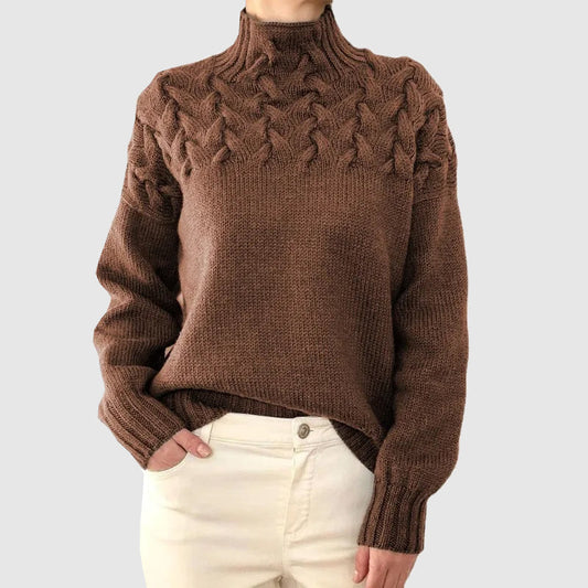 Women's cable knit turtleneck sweater with long sleeves