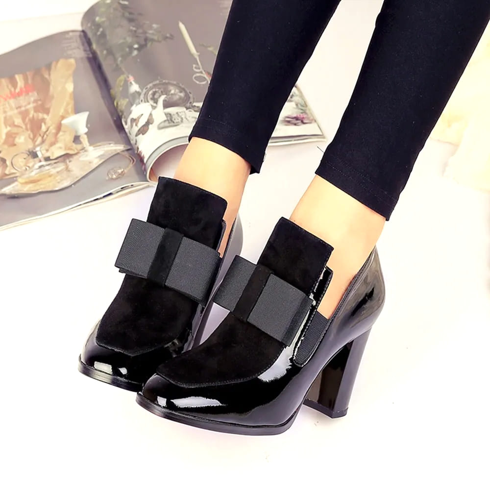 Women's paneled bow block heels