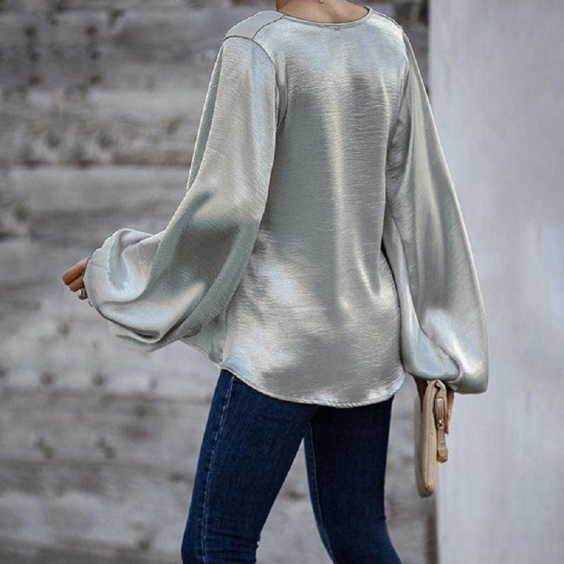 Women's satin blouse with v-neck and lantern sleeves