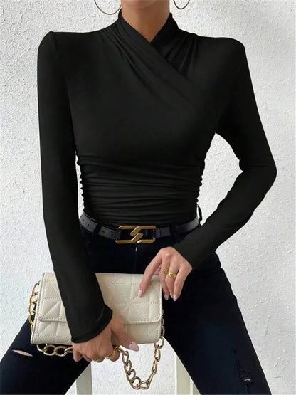 Women's pleated shirt with elegant long sleeve