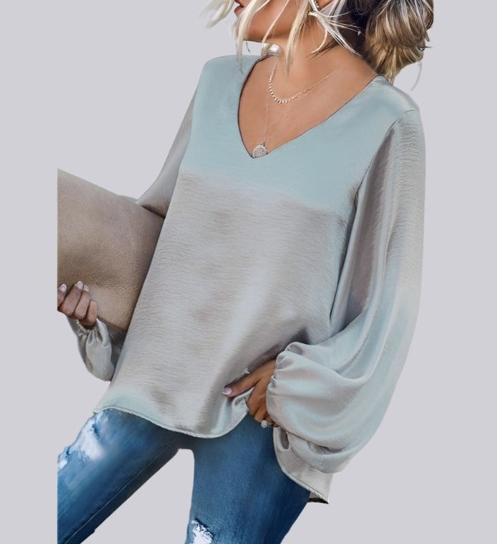 Women's satin blouse with v-neck and lantern sleeves