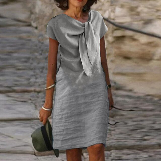 Women’s Evening Dress – Relaxed Fit – Mini Length – Short Sleeve – Statement Bow