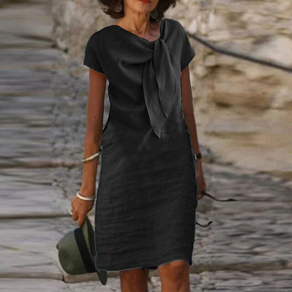 Women’s Evening Dress – Relaxed Fit – Mini Length – Short Sleeve – Statement Bow