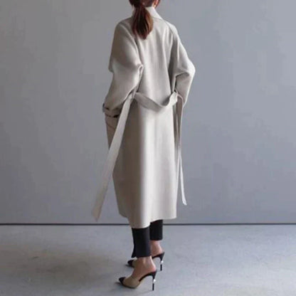 Women's oversized women's coat with belt and narrow collar