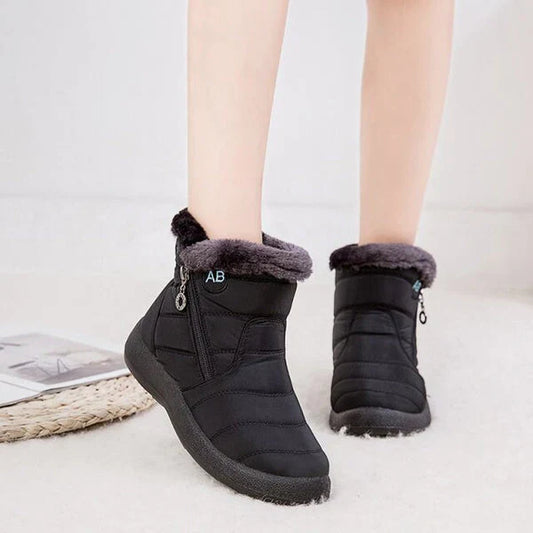 Women's warm winter snow boots with fur trim and zipper closure