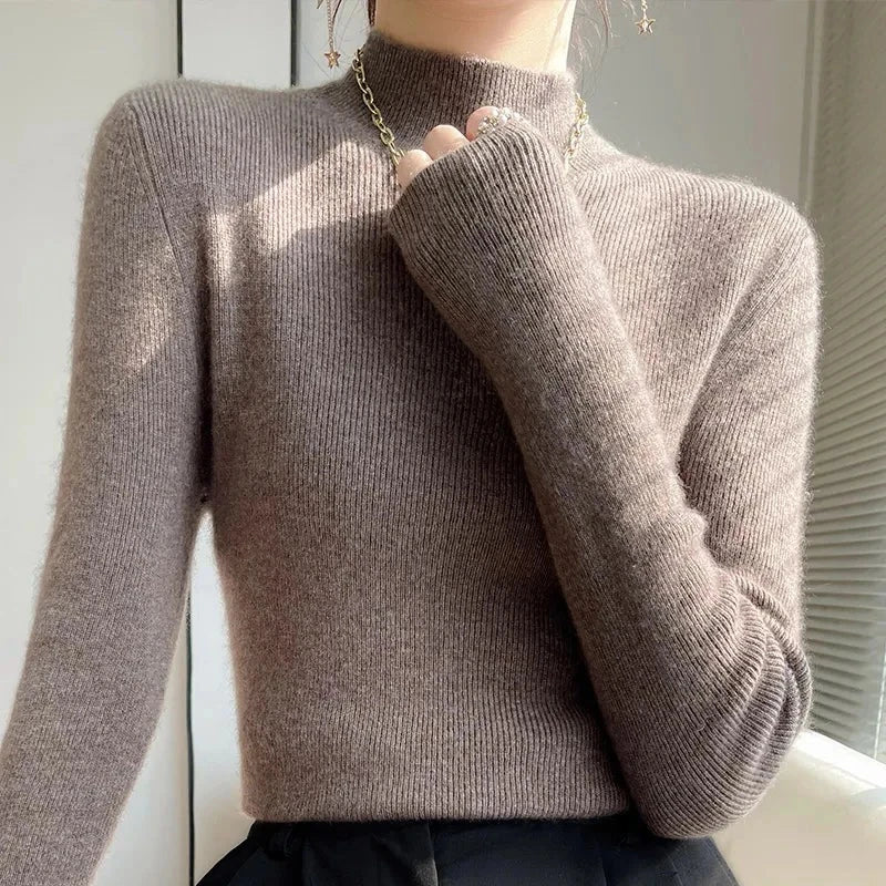 Women's knit sweater with half turtleneck and long sleeves