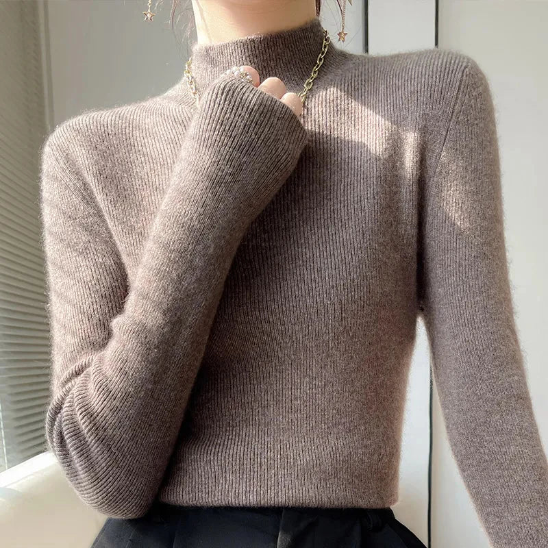 Women's knit sweater with half turtleneck and long sleeves