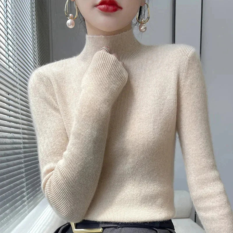 Women's knit sweater with half turtleneck and long sleeves