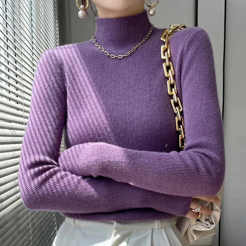 Women's knit sweater with half turtleneck and long sleeves