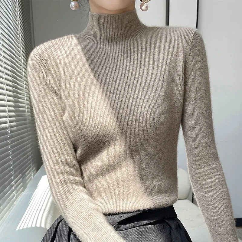 Women's knit sweater with half turtleneck and long sleeves