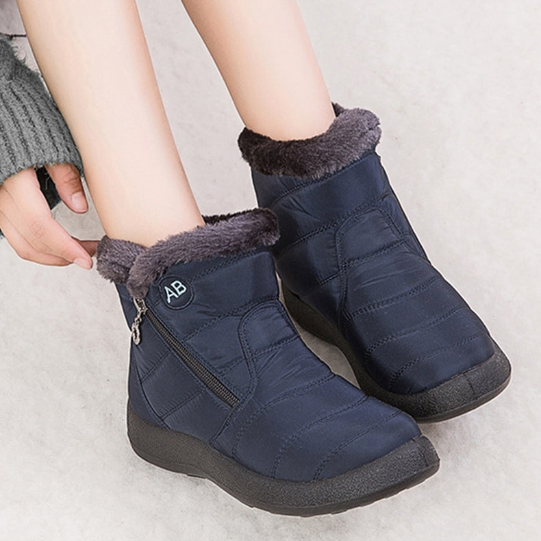 Women's warm winter snow boots with fur trim and zipper closure