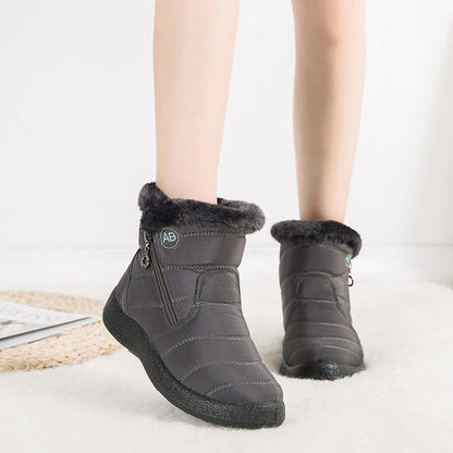 Women's warm winter snow boots with fur trim and zipper closure