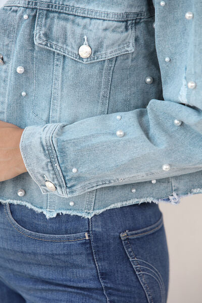 Women's denim jacket with raw hem and pearl trim