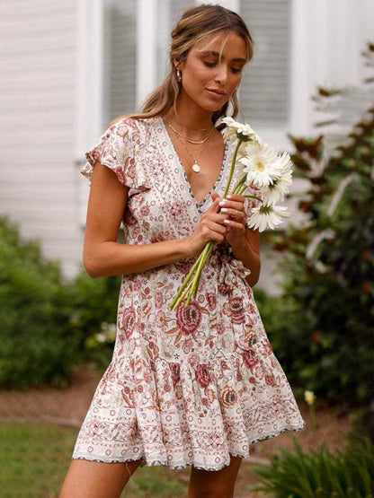 Women's Wrap Dress - Floral Print - V-Neck - Short Flutter Sleeves - Flowy Silhouette